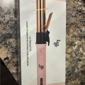 Brand new never out of package L’ange hair curling iron Rotating